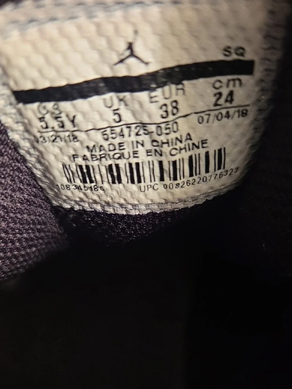 Jordan Kids Black and White High-Top Sneakers